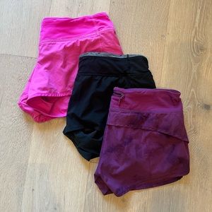 Lululemon speed short size 8, 3 pair bundle. Pink, Purple, black